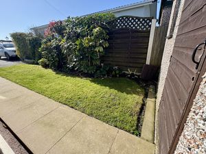 Side Garden & Store- click for photo gallery